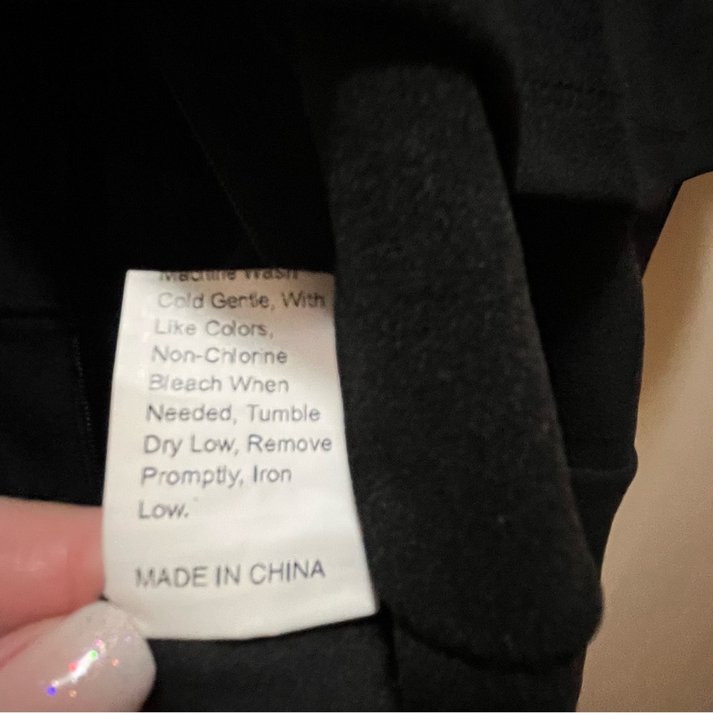 Chic Black Off-Shoulder Jumpsuit with Ruffle Detail - Picture 10 of 10